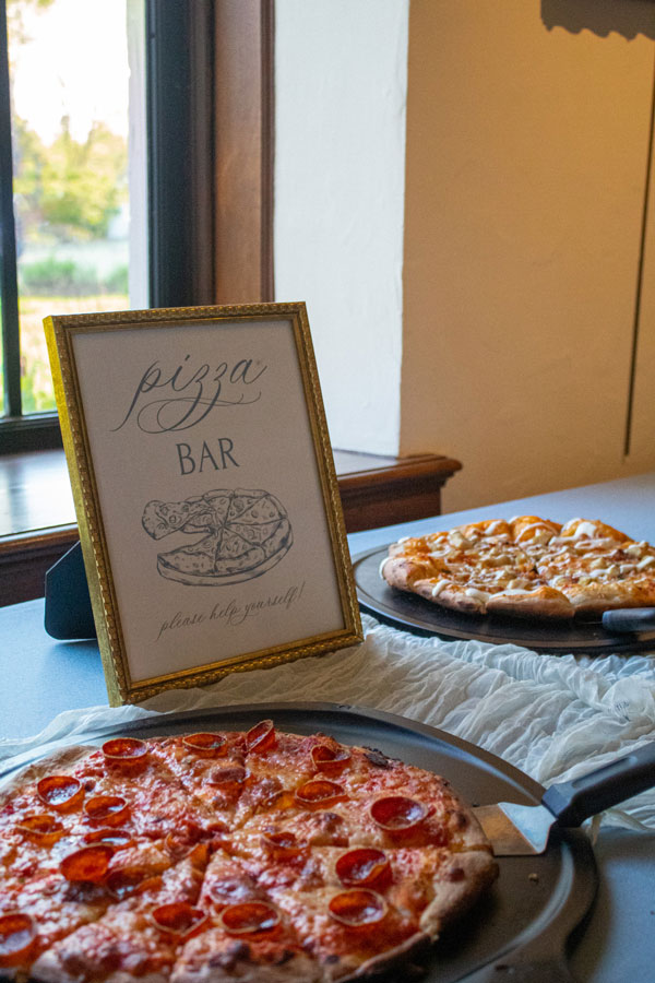 Pizza Bar with a sign